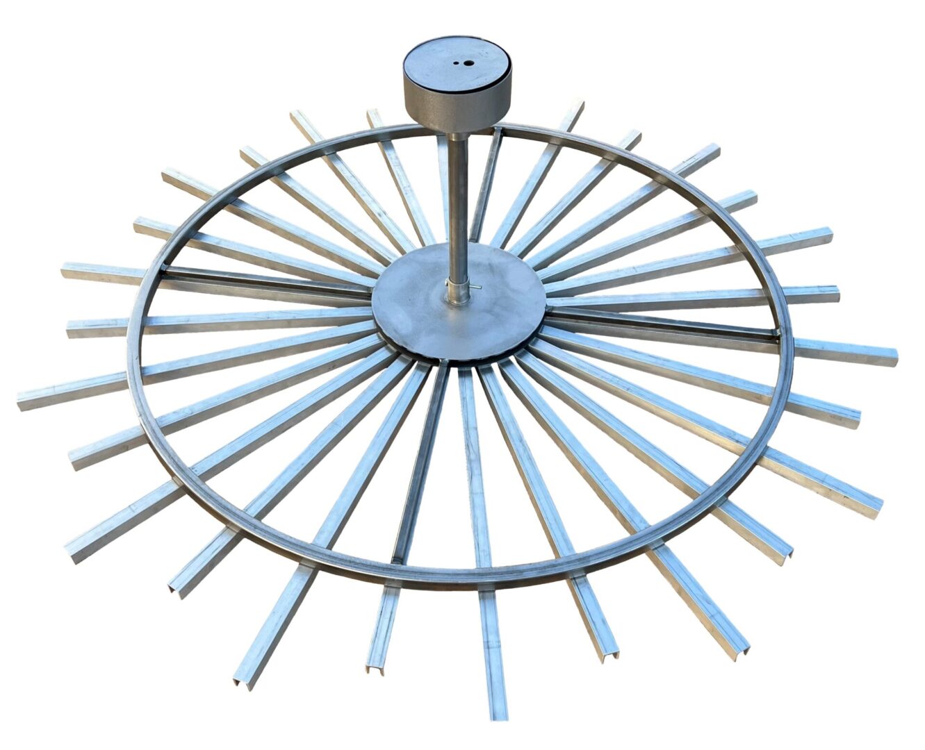 A metal circular structure with a round base.